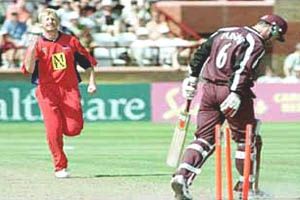 Glen Chapple celebrates after bowling out Parsons