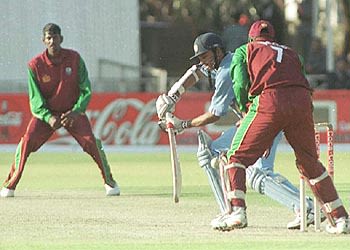 Hemang Badani opens the face of his bat to glide Nagamootoo