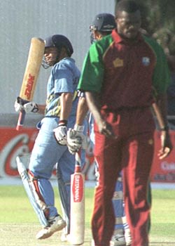 A boundary of Reon King brings Tendulkar his fifty