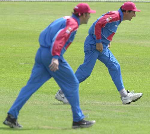 Dermot Reeve and Derek Randall patrol the covers