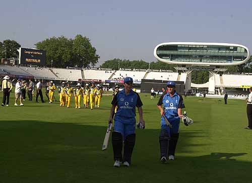 Clare Taylor and Claire Taylor leave the pitch at the end of the match