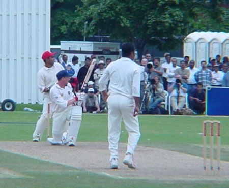 Wright sweeps a delivery from Harris