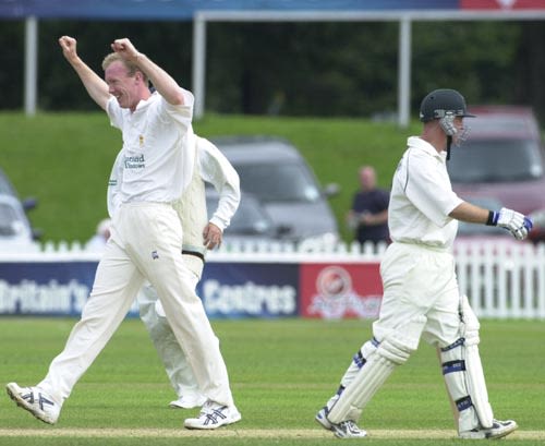Kevin Dean takes a wicket for Derbyshire with Johnson LBW for 39 runs. Frizzell CC, 22nd July 2002.