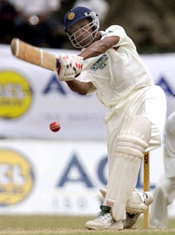 Chamila Gamage in mid-stroke during his fifty at Colombo