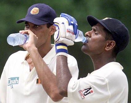 Players take a drinks break during the second Test at Sinhalese Sports Club Ground