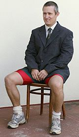 Stuart Carlisle poses for a top-half portrait