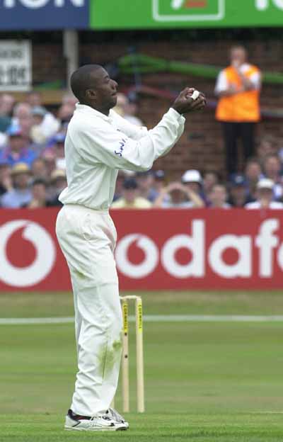 Adrian Griffith catches Darren Gough