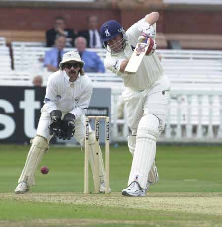 Neil Smith drives as Jack Russell can only watch