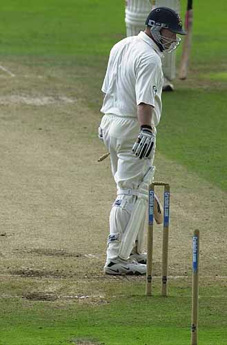 John Morris is clean bowled by Sheriyar for 6