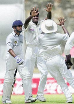 Sri Lankans celebrate the dismissal of Sameer Dighe