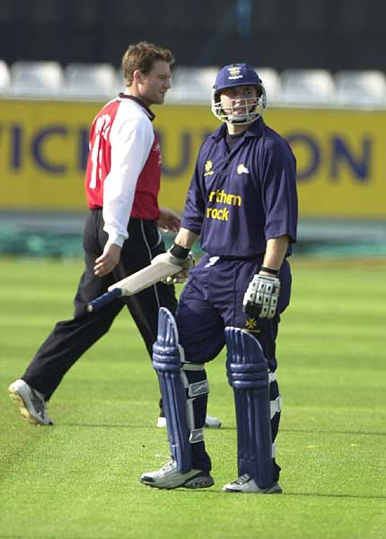A disconsolate Ashley Thorpe walks off after being caught on the boundary for 9