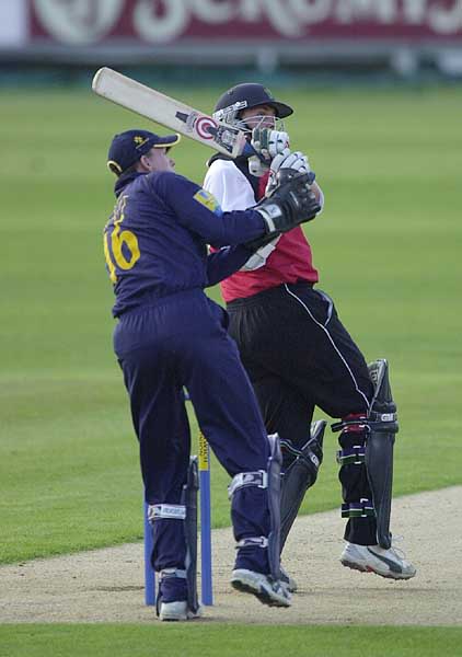 Ian Thomas hooks a Mark Davies delivery to the hands of Peng to be caught out for 8