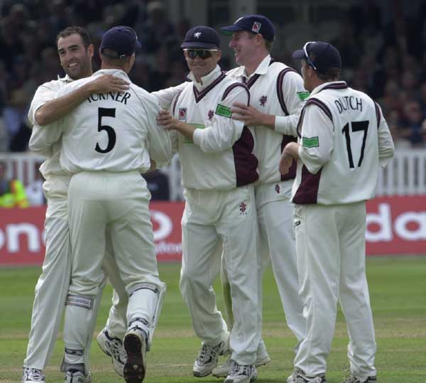 Richard Johnson is the Somerset hero as he is embraced by Turner and team mates