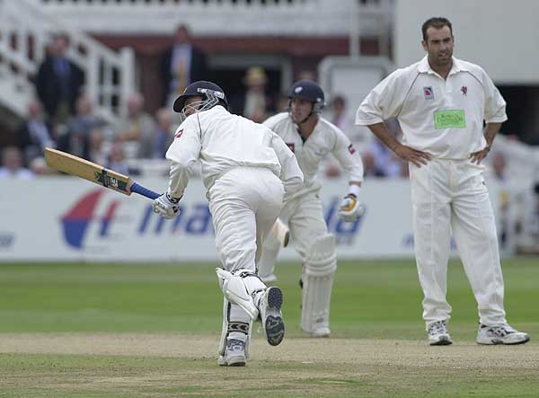 Yorkshire openers White, left, and Wood pile up the runs as Richard Johnson looks less than pleased
