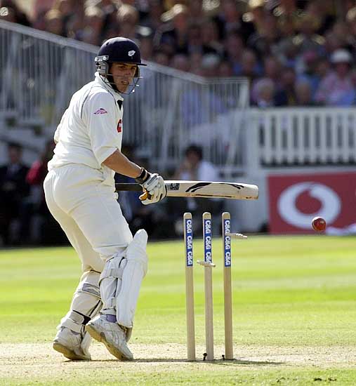 Matthew Wood is aghast to have played on to a Johnson delivery for 19