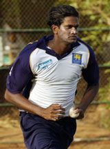 Nuwan Zoysa bowls in the nets