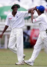 Suresh Perera congratulates Nimesh Perera, SL Board XI v Australians, 1999/00