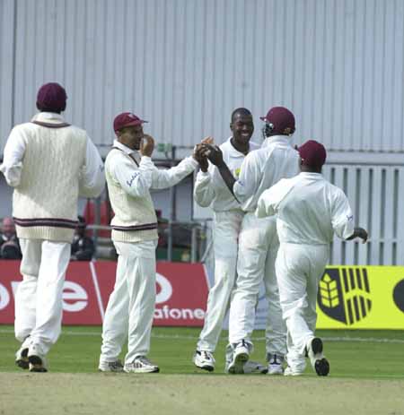 Griffith celebrates after the run out of White