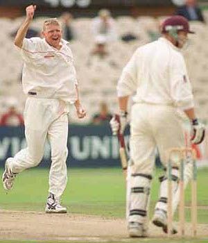 Peter Martin celebrates getting out Burns