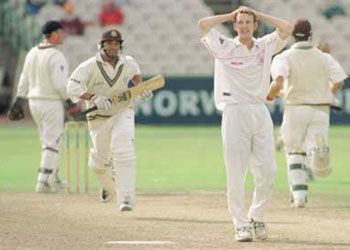 Chris Schofield goes close to getting out Gary Butcher