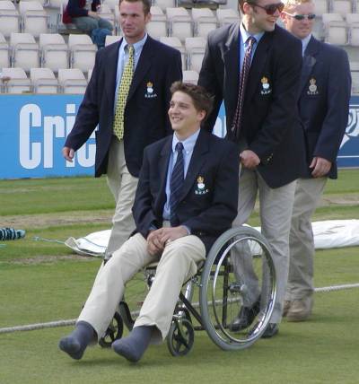 Charlie pushed around on Lap of honour