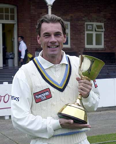 Richard Blakey celebrating the CricInfo Championship success