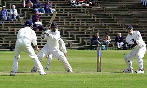 Essex debutant Sharif cuts a ball past keeper Blakey