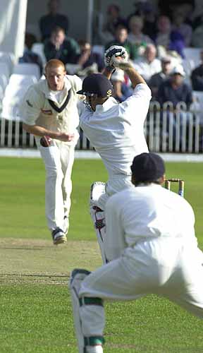 Richard Clinton takes a wild swing at a delivery from Kirby in the Essex second innings