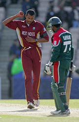 Merv Dillon grabs another wicket on his to 5 for 29