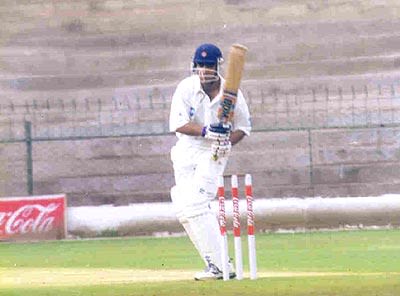Arun Kumar sweeps the ball to fine leg of T Kumaran