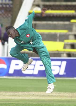 Tony Suji in fine bowling style v India