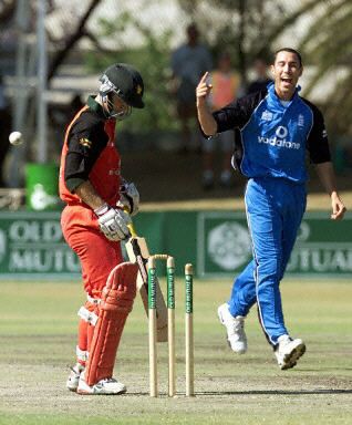 Ben Hollioake celebrates the wicket of Stuart Carlisle