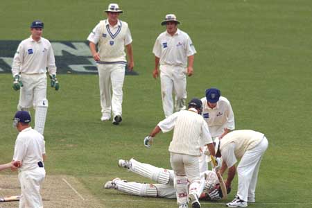 Kremerskothen lies on the ground injured, New South Wales v Tasmania, Pura Cup, 2001/02