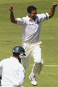 Darren Wates of Western Australia claims the wicket of Trevor Gripper of Zimbabwe