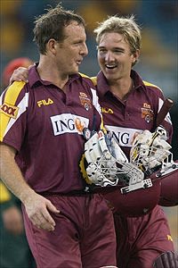 Wade Seccombe and Nathan Hauritz of the Bulls celebrate winning