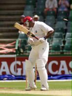 Philo Wallace is bowled by Pollock