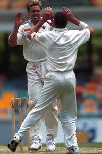 Scott Muller celebrates after taking the wicket of Sachin Tendulkar