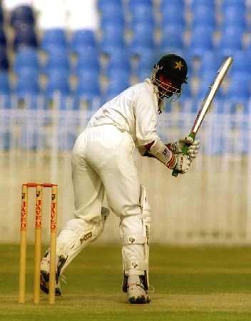 Qaisar Abbas follows the ball as he tucks it away to fine leg