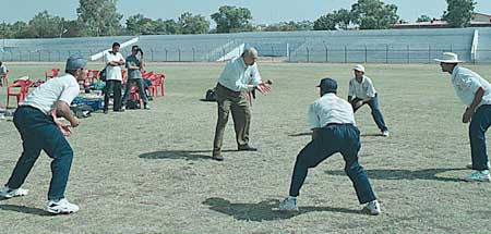 Raj Singh Dungarpur giving catch practice to Sodhi,Doru, Gambhir and Patel