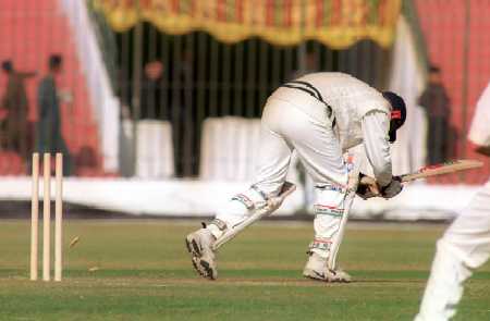 Bails fall as Sajid Shah misjudges the length of the ball