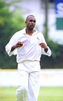 Mario Vellavarayan prepares to bowl