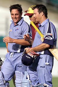 Steve Waugh and Mark Higgs celebrate a Blues victory