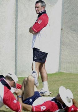 Coach Phil Neale watches over proceedings with a keen eye