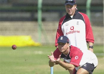 Martyn Ball checks out how hopeful stumper Warren Hegg gathers the ball