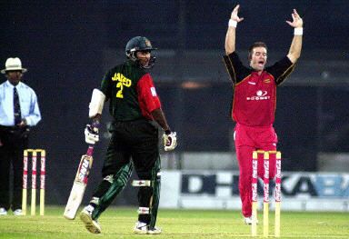 Travis Friend celebrates the wicket of Omar