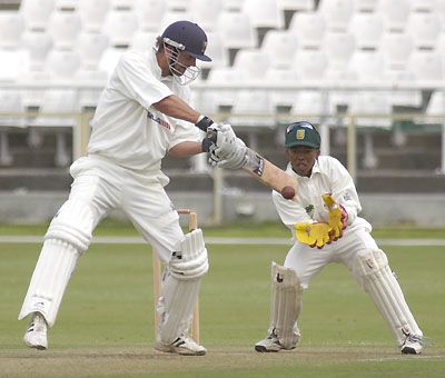 Andrew Puttick cuts a ball against North West
