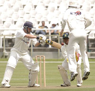 Derrin Bassage cuts a ball against North West