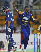 Dinusha Fernando celebrates dismissing Michael Vaughan