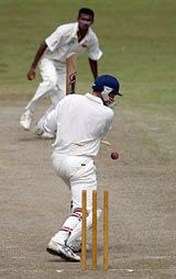 Ashley Giles is bowled by Chamila Gamage on the final day of England's warm-up match at Colombo CC