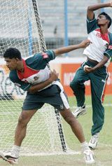 Mushfiqur Rahman and Manjural Islam Rana practise